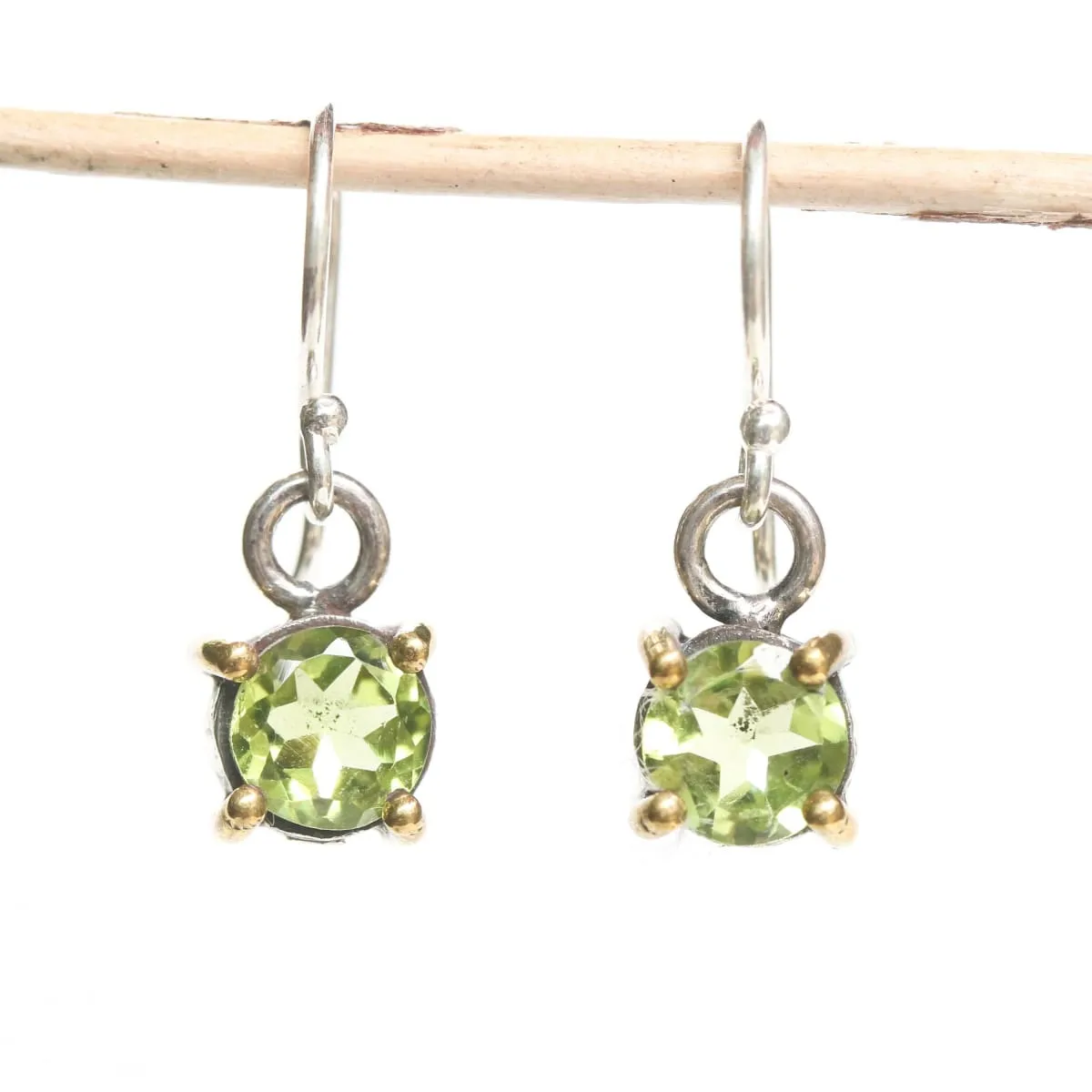 Earrings round faceted peridot in silver bezel and brass prongs setting with sterling silver hooks style