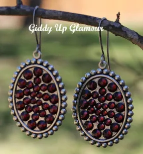 Pink Panache Small Silver Oval Earrings with Maroon Crystals